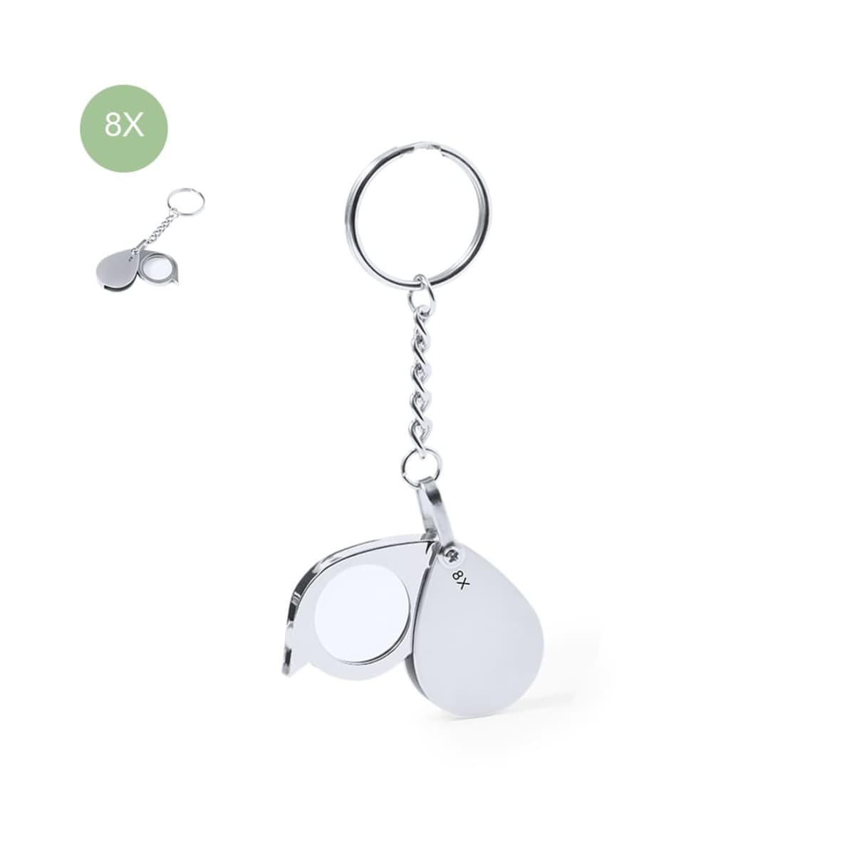Silver folding magnifying glass keychain with 8X magnification.