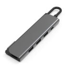 Sleek gray USB-C hub with multiple ports, including USB and HDMI.
