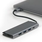 USB hub connected to a laptop with three USB ports and an HDMI port visible.