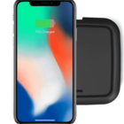 Smartphone on wireless charger showing 75% charged.