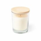 A white candle in a transparent glass jar with a light wooden lid. The wick is visible in the center. The background is plain white.