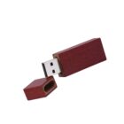 Wooden USB flash drive with its cap removed, showing the metal connector.