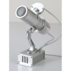 Silver stage spotlight on a mounting bracket with adjustable arm.