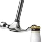 Hammer opening a bottle by prying off the cap.