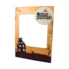 Halloween-themed photo frame with haunted house and spider webs.