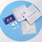 Privacy care kit with RFID card, USB data blocker, and webcam cover on a blue background.