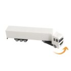 Toy truck making a right turn, with an orange arrow indicating direction.