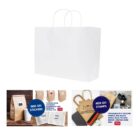 White shopping bag with paper handles; customizable with stickers or stamps.