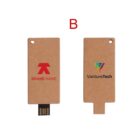 Two cardboard USB drives with different colorful logos on each side.