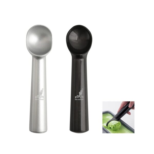 Silver and black ice cream scoops, with one scooping green ice cream.