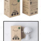 Eco-friendly Pomodoro timers with packaging, featuring a simple, rounded design.
