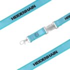 A turquoise lanyard with the word HEIDENHAIN printed in black. It features a metal clasp and a hook attachment, designed for holding items such as keys or ID badges. The lanyard is displayed at various angles on a white background.
