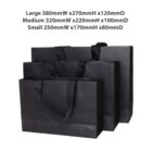 Black shopping bags in three sizes with dimensions labeled above.