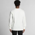 Person in a white long-sleeve shirt and black pants, seen from the back.