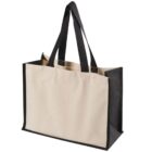 Canvas tote bag with black handles and edges, standing upright.