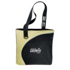 Two-tone tote bag with pens and Deliver the Growth Promise printed on it.