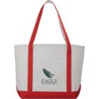 White and red tote bag with Eagle Academy logo.
