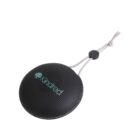 Round black Bluetooth speaker with kindred logo and carrying strap.