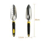Two garden trowels with black and yellow handles, one with a ruler etched on the blade.