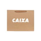 Brown paper bag with CAIXA printed in white.