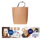 Brown tote bag with customizable stamp and sticker options displayed.