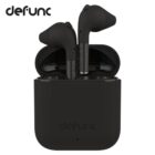 Black wireless earbuds in an open charging case with defunc branding visible.