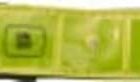 A green and black guitar strap with an image of a tree and text that appears to read Club Boss.