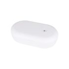 White, oval-shaped UV sterilizer box with a button on top.