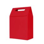 A red, rectangular gift bag with a built-in handle on top.
