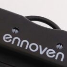 Close-up of a black object with the word ennoven in white text.