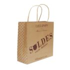 Brown Lollipops shopping bag with Soldes text and dotted pattern on the side.