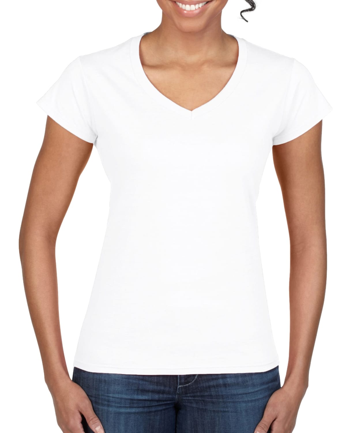 Woman wearing a plain white V-neck T-shirt and blue jeans, smiling.