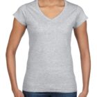 Woman wearing a plain, light gray, short-sleeve V-neck T-shirt and blue jeans.