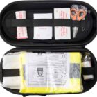 First aid kit with scissors, alcohol pads, and emergency supplies in a black zippered case.