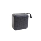 Black portable Bluetooth speaker with a perforated front and a fabric loop for carrying.