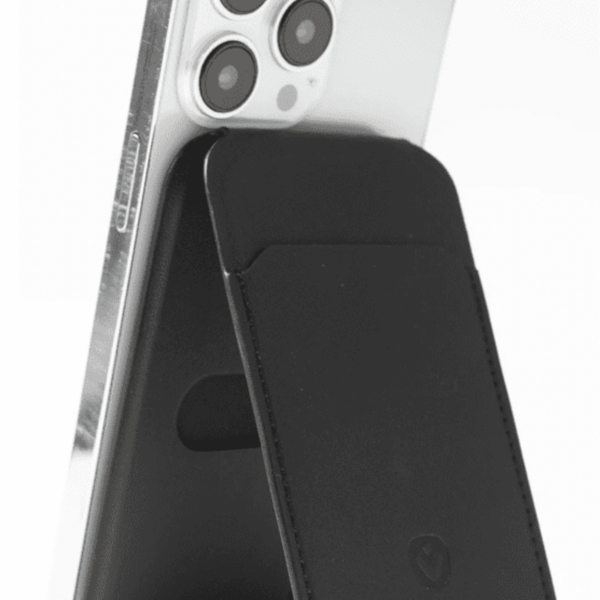 A smartphone with a black wallet-style stand attached to its back.