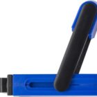 Blue and black handheld stapler with the handle partially open, side view.