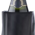 Champagne bottle in a black insulated sleeve, white background.