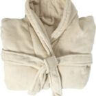 Beige plush bathrobe folded with a belt tied in the front.