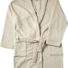 A beige, plush bathrobe with a belt and two front pockets.