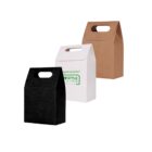 Three gift bags: black, white with text, and brown, arranged side by side.