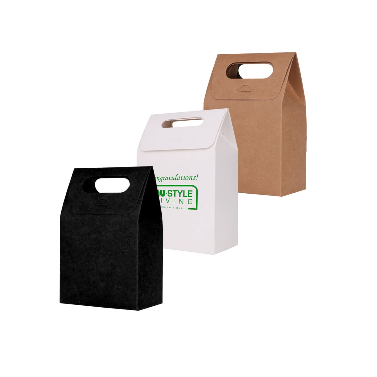 Three gift bags: black, white with text, and brown, arranged side by side.
