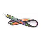 A colorful lanyard with a vibrant rainbow camouflage pattern and black edging, featuring a metal clasp and a plastic buckle for attachment.