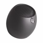 Compact black spherical speaker with water droplet on its side, featuring a perforated top.