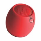 Red, teardrop-shaped speaker with perforated top and water droplet on the side.