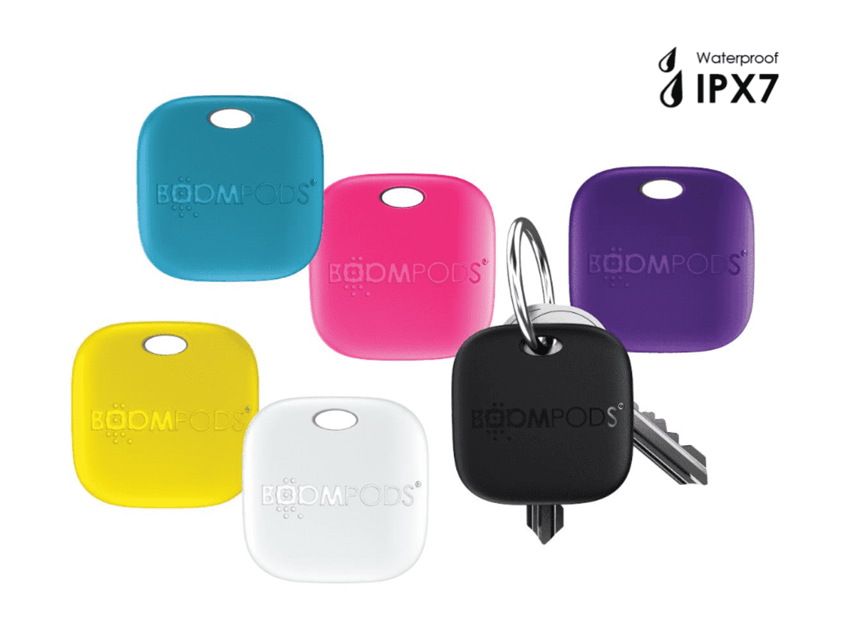 Six colorful square key finders, one with attached keys, labeled BOOMPODS and IPX7 Waterproof.