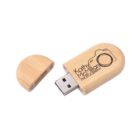 Wooden USB stick with camera logo and Kathy McMillan Photography text.