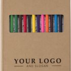 Brown notebook with colored pencils visible through a window, and Your Logo and Slogan text.