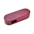 Wooden oval-shaped whistle with a smooth finish.