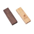 Two wooden USB flash drives, one dark and one light, with logos engraved on them.